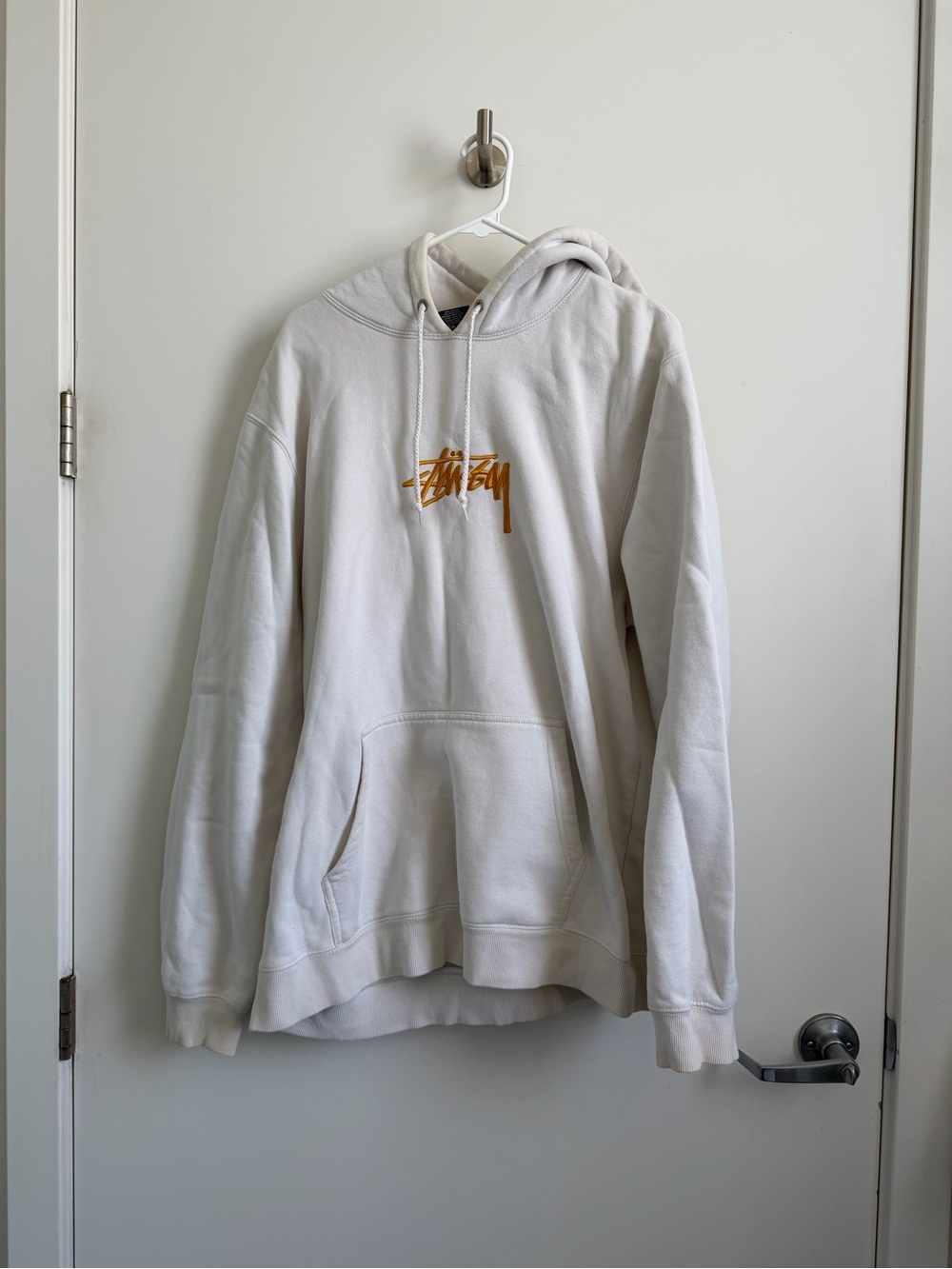 Stussy Cream Crewneck Hoodie with Gold Script Logo